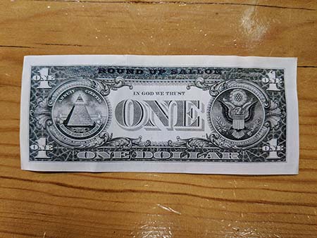 Round Up Saloon dollar bill back